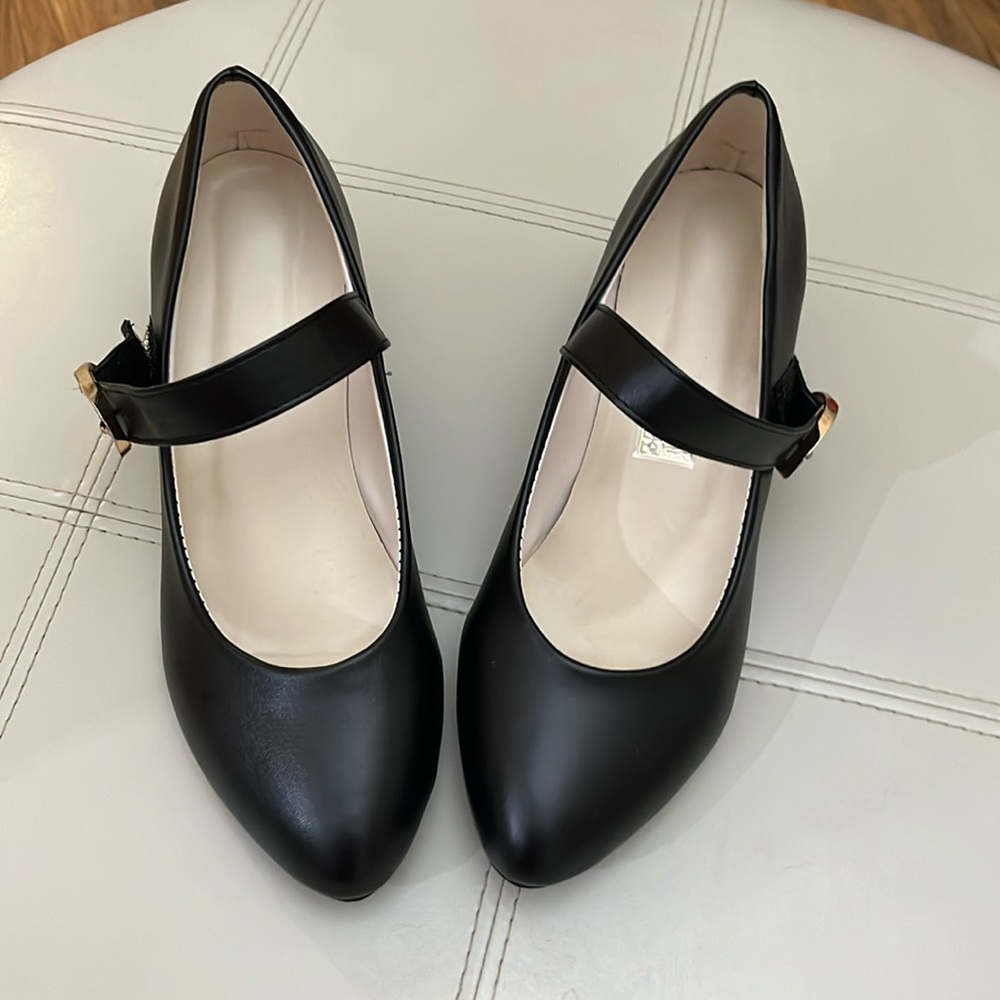 Brand new faux leather black strap heels